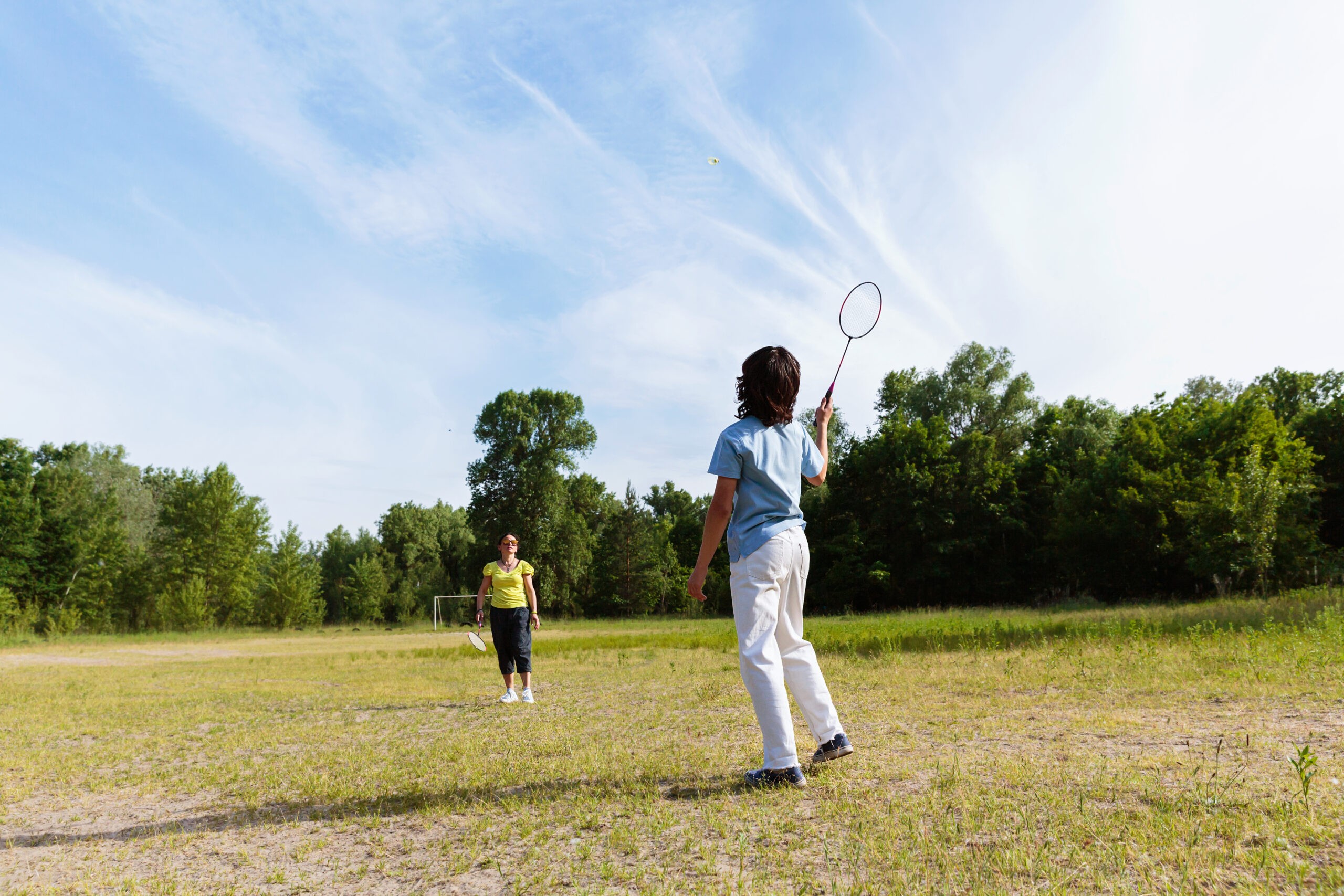 woman-picking-up-shuttlecock-during-badminton-2025-01-27-18-15-07-utc-scaled_main