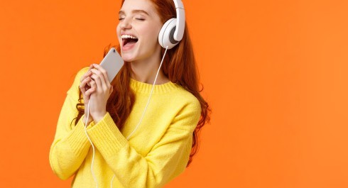 girl-carried-away-while-listen-favorite-track-pretty-redhead-female-enjoy-music-new-headphones-pa_main