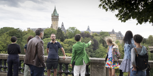 Group of visitors looking at the view of the BCEE building